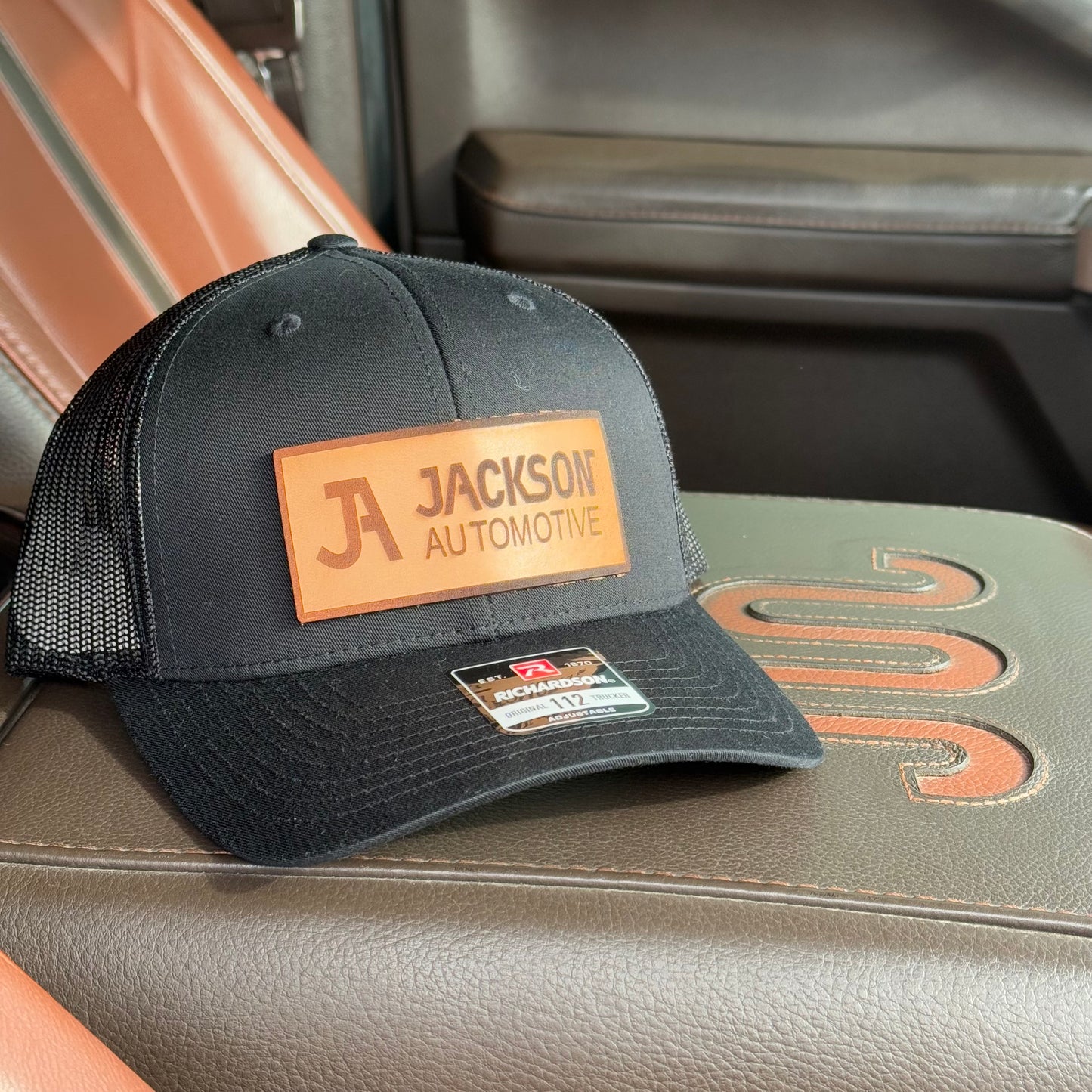 JA Leather Patch Snapback Trucker Hat