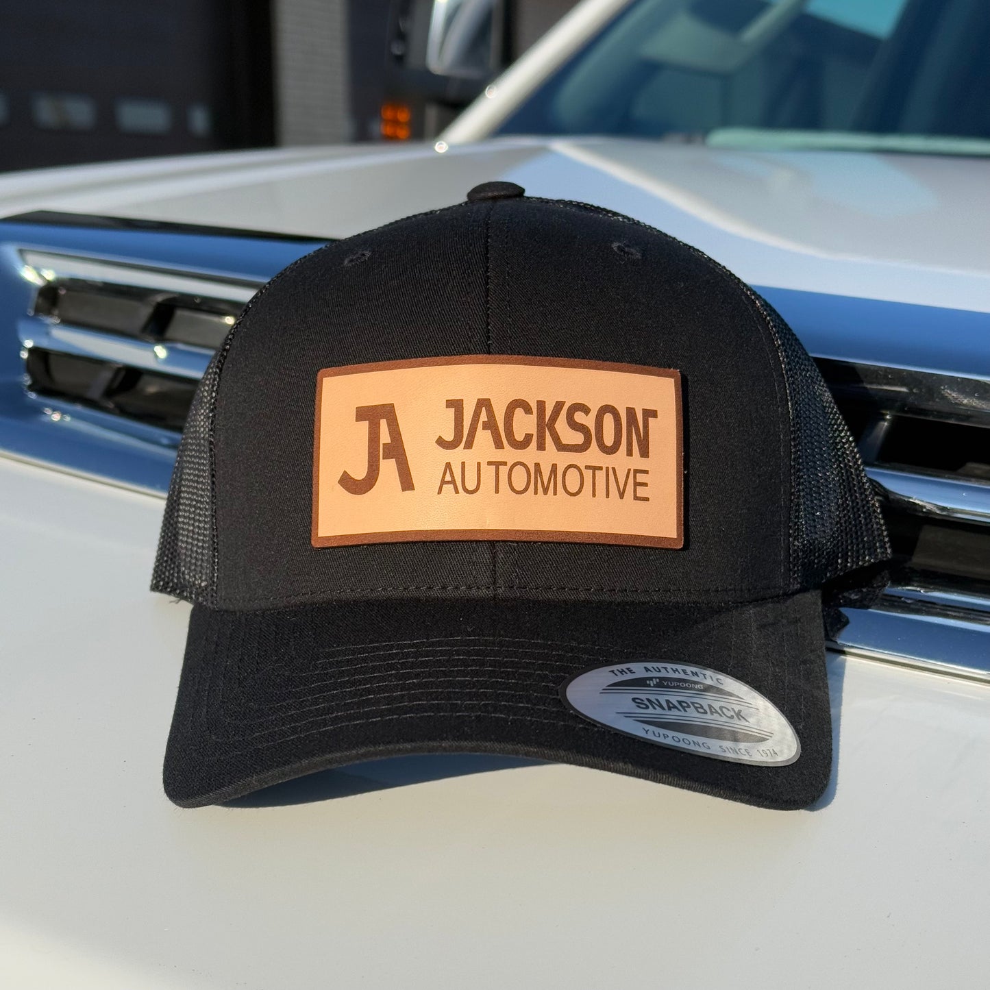 JA Leather Patch Snapback Trucker Hat